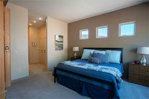Carpeted bedroom featuring recessed lighting