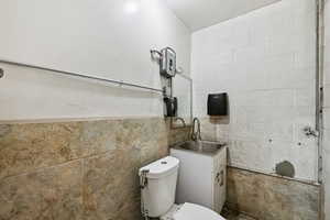 Bathroom featuring toilet and a sink