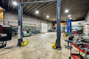 Garage featuring a workshop area