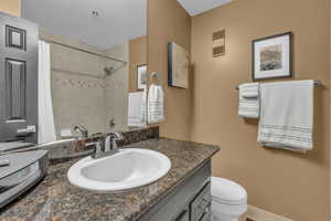 Full bathroom with new fixtures and lighting.