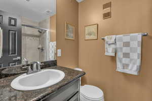 Tile shower, upgraded fixtures and lighting.
