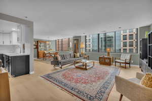 Custom flooring, paint, and shades. If you really have to pull the shades down and block that view, go ahead!