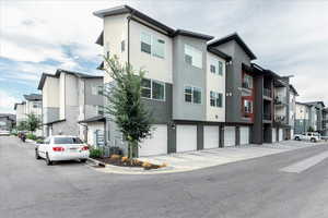 View of property with a residential view