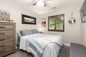 Bedroom with carpet and ceiling fan