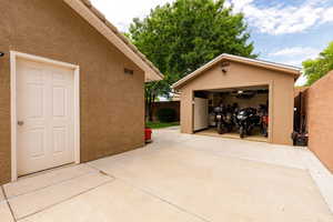 Detached garage featuring fridge