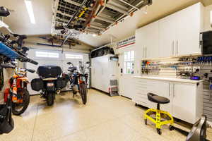 Garage featuring a workshop area
