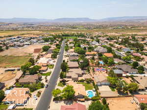 Aerial perspective of suburban area with mountains