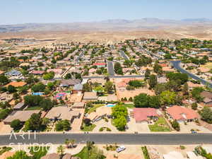 Aerial view of residential area with a mountain backdrop