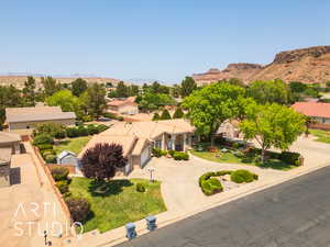 Aerial view of residential area featuring mountains