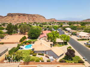 Aerial view of residential area with a mountain backdrop