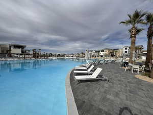 Community pool with a patio area