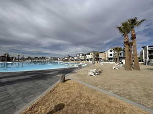 Community pool with a patio area