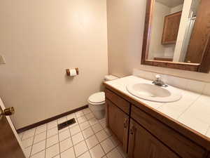 Bathroom featuring vanity and light tile patterned floors