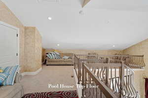 Corridor with carpet and an upstairs landing