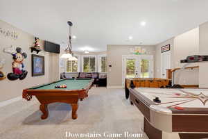 Recreation room featuring billiards, light carpet, recessed lighting, and french doors
