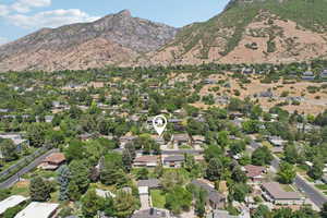Aerial overview of property's location with a mountainous background