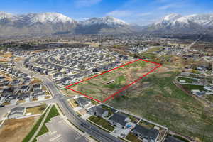 North East aerial view of property and surrounding area featuring property boundaries highlighted