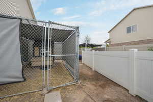 Gate featuring an outdoor structure