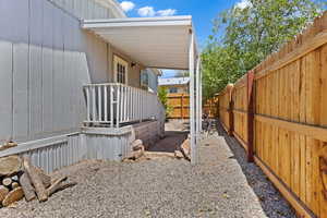 View of fenced backyard