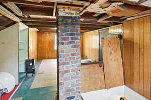 Below grade area with wood walls