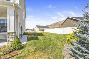 View of yard with a mountain view