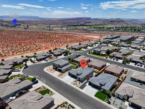 Aerial perspective of suburban area featuring mountains