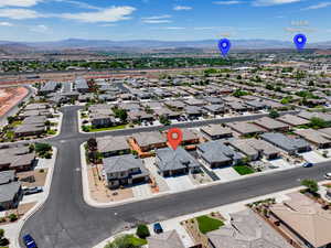 Aerial perspective of suburban area featuring mountains