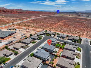 Aerial view of residential area with a mountainous background