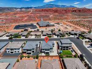 Aerial view of residential area with a mountain backdrop