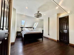 Bedroom featuring wood finished floors and recessed lighting