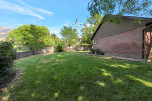 View of fenced backyard