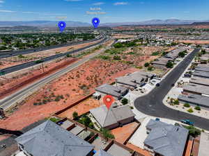 Aerial perspective of suburban area with mountains