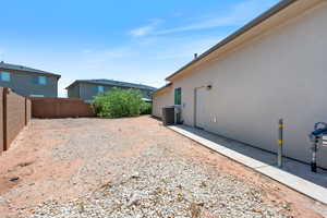 View of fenced backyard