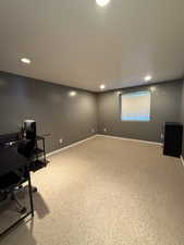 Unfurnished office with carpet flooring and recessed lighting