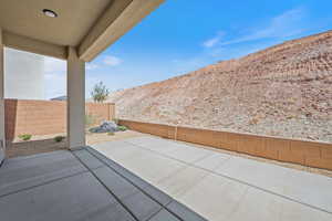 View of patio with a mountain view