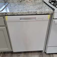 Kitchen view of white dishwasher