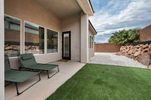 Fenced backyard featuring a patio area