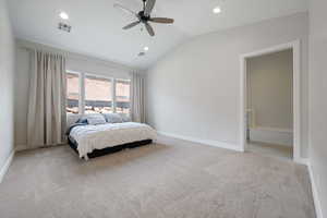 Carpeted bedroom with vaulted ceiling, recessed lighting, and a ceiling fan