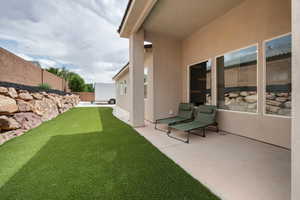 View of yard with a patio