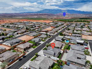 Aerial view of residential area with a mountain backdrop