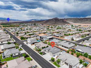 Aerial view of residential area with a mountain backdrop