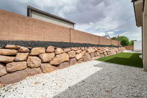 View of fenced backyard