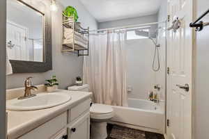 Full bathroom featuring vanity and shower / tub combo