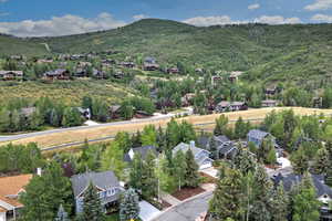 Aerial perspective of suburban area with mountains