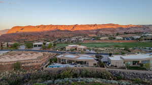 Mountain view featuring nearby suburban area