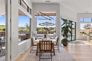 Dining area featuring light wood-type flooring