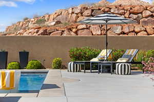 Outdoor pool with a patio