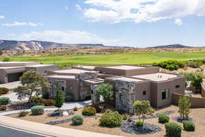View of mountain background featuring a local golf course