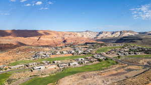 Mountain view with a golf course and nearby suburban area