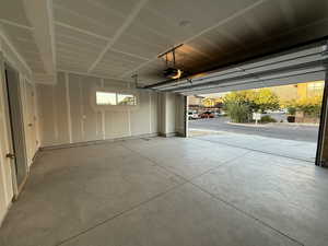Garage featuring a garage door opener